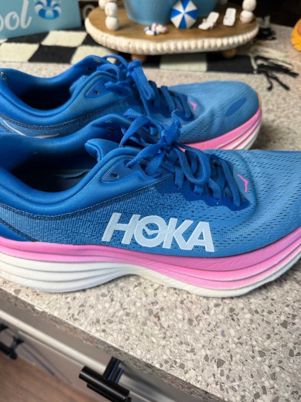 Hoka Women's Blue Running Shoes with Pink Midsole Accents